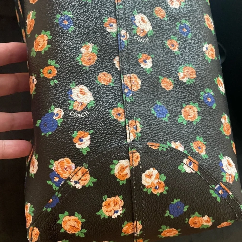 Coach reversible city tote in great overall condition has some wear at handles.